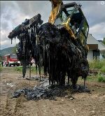 Bagger im Teerschlamm